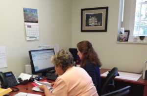 Registrar of Voters (l) Sue Day (R) and (r) Karen Martin at work at the Barkhamsted Town Hall